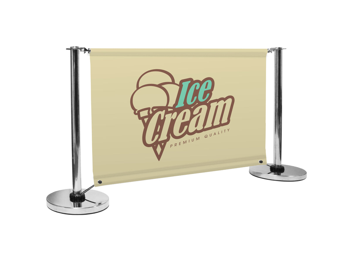 AdfrescoLT cafe barrier featuring a beige banner with an ice cream logo, including an illustration of a cone with two scoops and the text 'Ice Cream' along with 'Premium Quality.' Supported by chrome posts, it's perfect for ice cream shops and cafés in the UK looking to enhance outdoor branding.